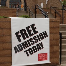 A sign indicating that admission is free.