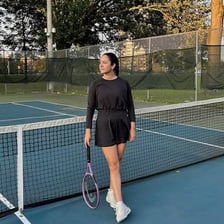 A tennis player wearing a skort, a skirt-like garment with shorts
