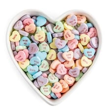 Conversation heart candy with an affectionate message