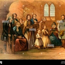 A church congregation singing from hymnals.