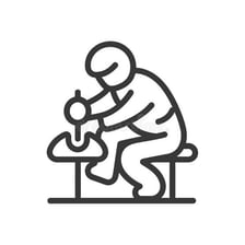 A person taking an object from a table