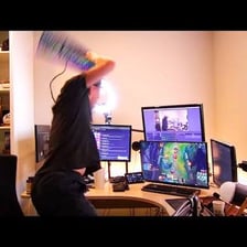 A person reacting angrily while playing a video game