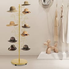 A freestanding rack holding several hats