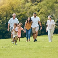 A family with children outdoors.