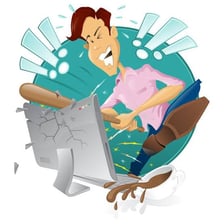 A person examining an error message while troubleshooting a computer.