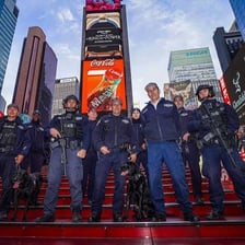 New York City police officers standing in Times Square.