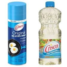 A bottle of Wesson cooking oil alongside a container of Crisco