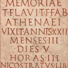 An ancient Roman inscription carved in Latin lettering.
