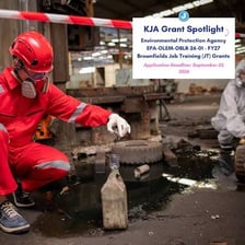 Workers conducting an environmental cleanup at a contaminated site.