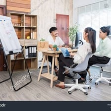 An advertising team presenting a campaign idea to a client