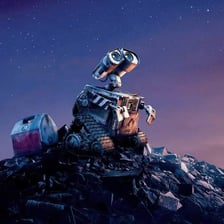 The WALL-E robot compacting trash in the Pixar film.