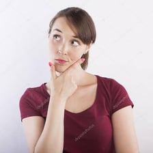 Person pausing thoughtfully with a hand on the chin