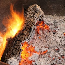 Ash remaining after a fire has burned down.