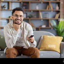 A relaxed person smiling casually