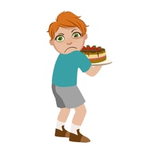 A child holding a toy while claiming it as their own