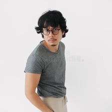 A person looking around cautiously in an unfamiliar setting