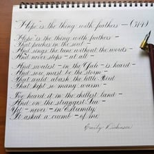 A manuscript or printed page of Emily Dickinson’s poem about hope