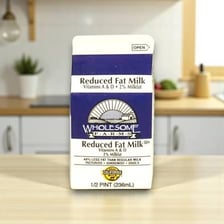A carton labeled reduced fat milk.