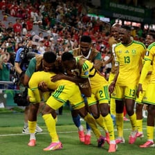 A team moving forward together during a victory celebration