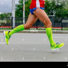 The legs of a runner during a marathon