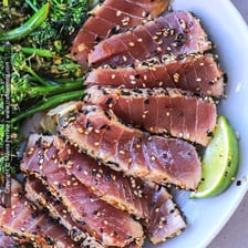 Slices of ahi tuna seared on the outside and rare inside
