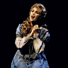 A stage performer portraying Fantine sings in Les Misérables.