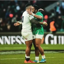 Competing athletes shaking hands after a game