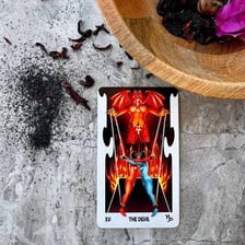 A tarot card depicting The Devil