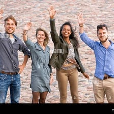 People waving as they say goodbye
