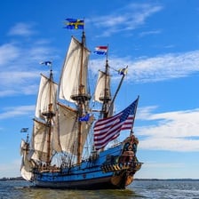 A ship sailing on open water.
