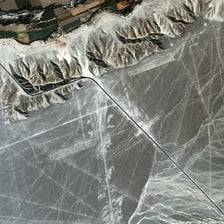 Aerial view of a Nazca Lines geoglyph in the Peruvian desert.