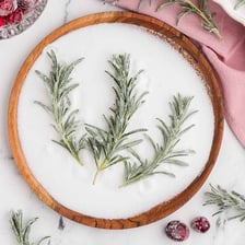 A small herb sprig used as a dinner garnish