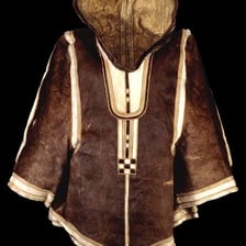 Inuit people in traditional Arctic clothing.