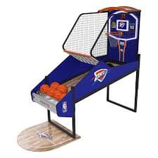 Oklahoma City Thunder players competing in an NBA basketball game.