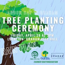 People planting a young tree for Arbor Day