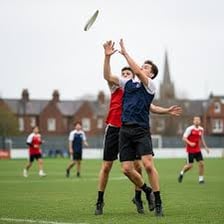 Players competing in an ultimate flying-disc game