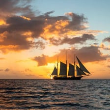 A ship traveling across open ocean waters.