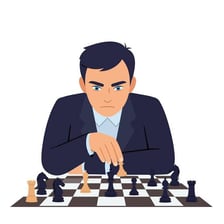 A chess player making a strategically strong move