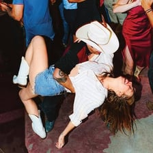A couple performing a Texas two-step at a country dance