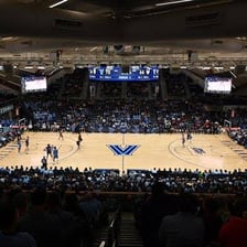 Villanova Wildcats players competing in a men’s basketball game