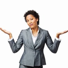 A person shrugging while offering a tentative opinion