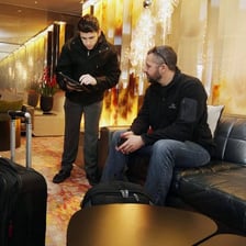 A hotel guest entering or checking into a room