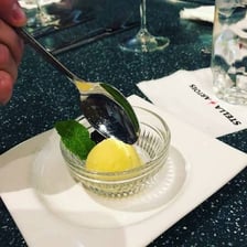 A small serving of sorbet used between meal courses