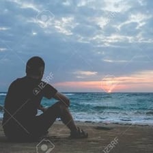 A person looking wistful while waiting for someone