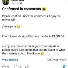 People discussing a movie while one person signals not to reveal plot details.