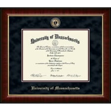 A Bachelor of Arts diploma displayed in a graduation setting.