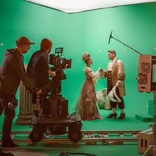 Actors performing on a television production set