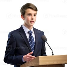 A speaker delivering a speech from a podium