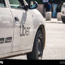 A rideshare vehicle displaying the Uber logo.