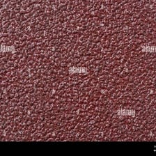 A close-up of a rough abrasive surface